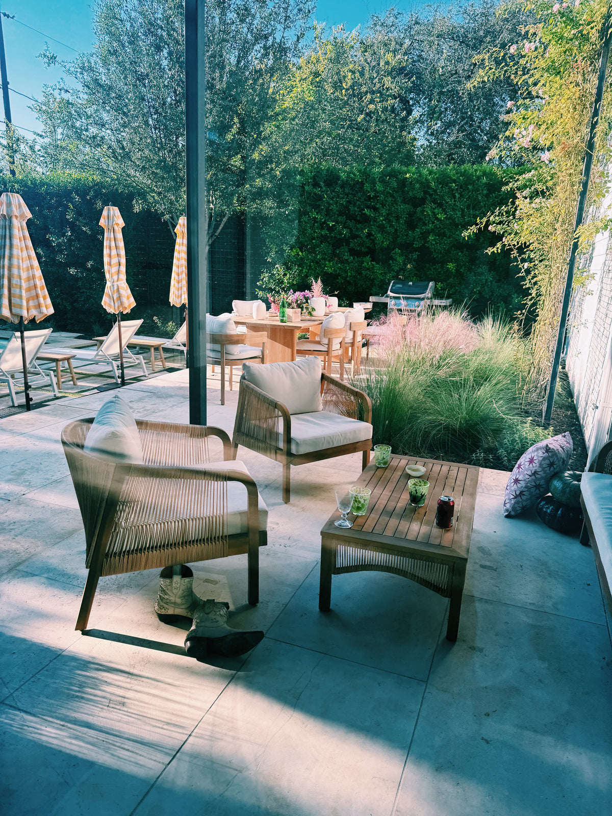 The terrace in the morning sun, chairs pushed back