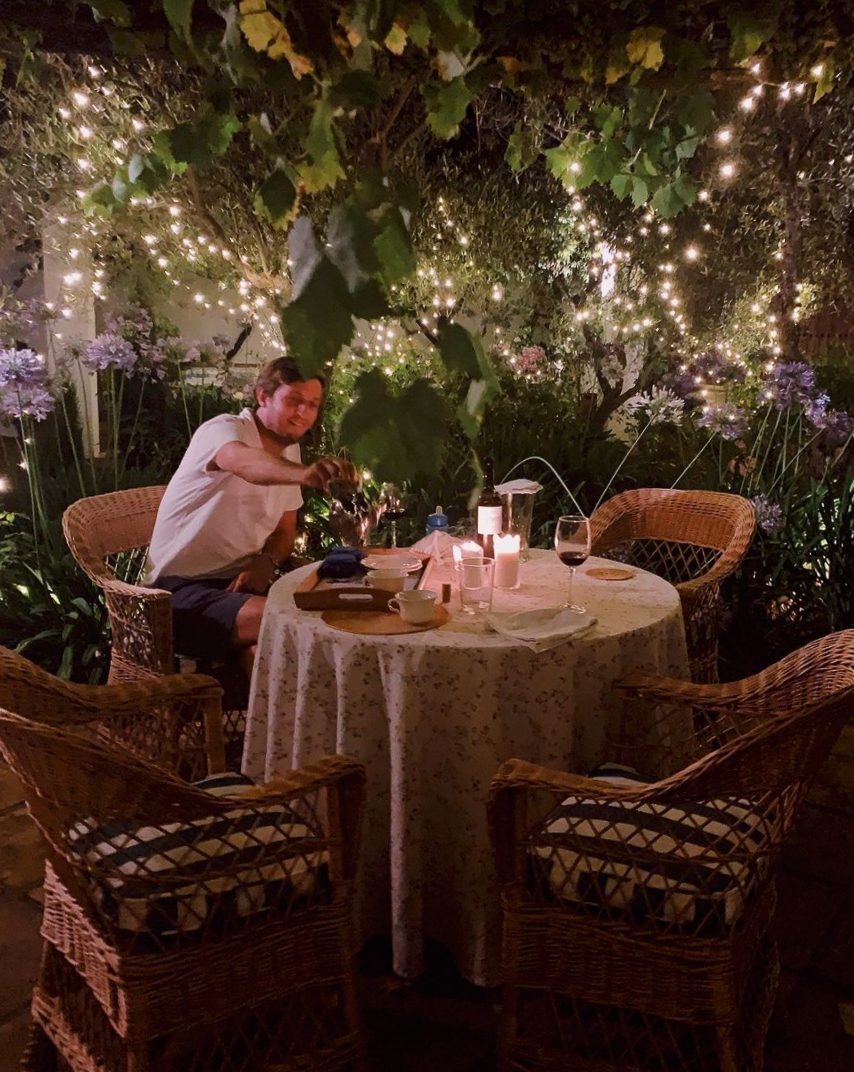 A candlelit table in the courtyard at Trasierra