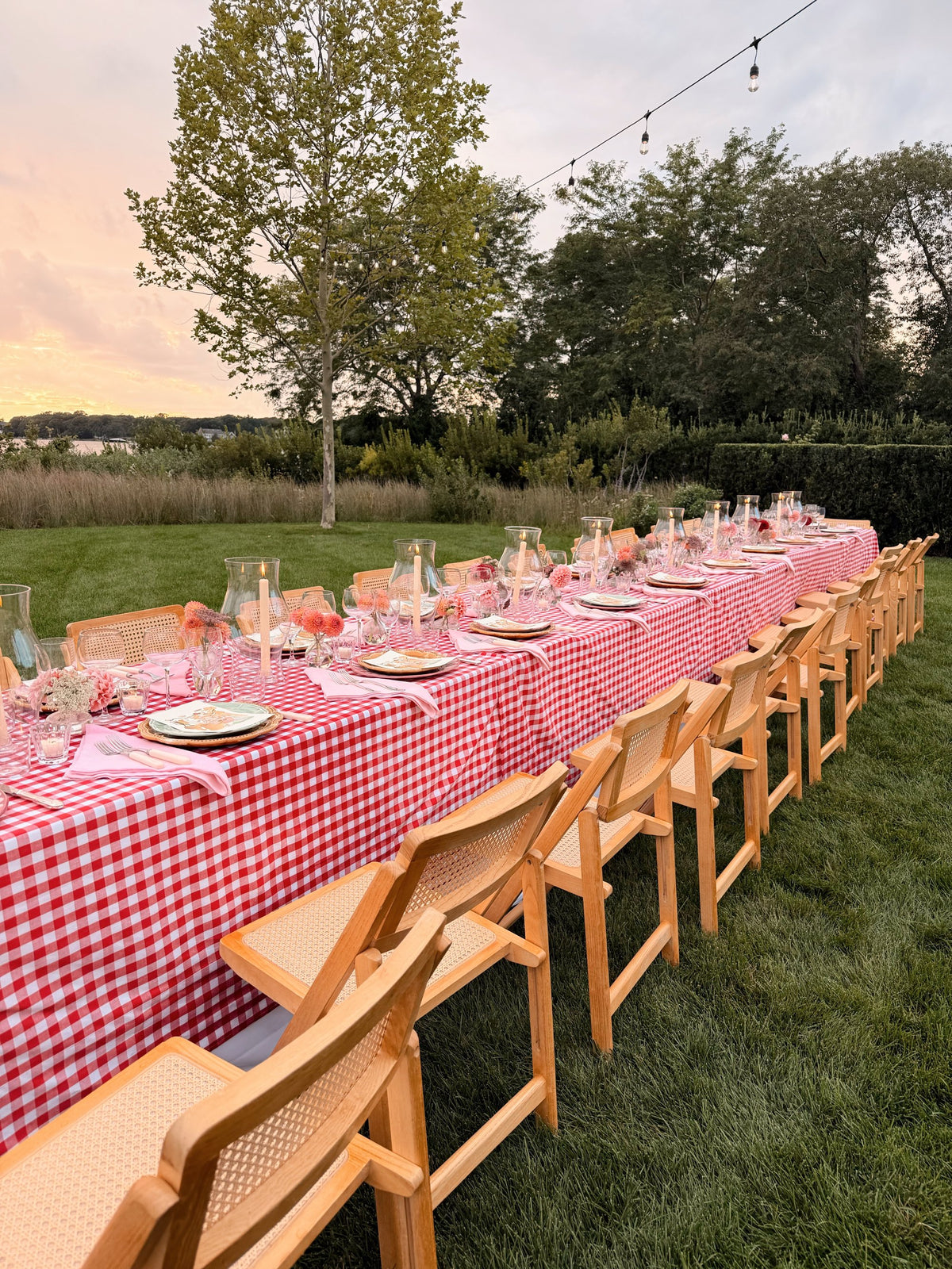 The gingham table laid on the lawn before anyone arrives