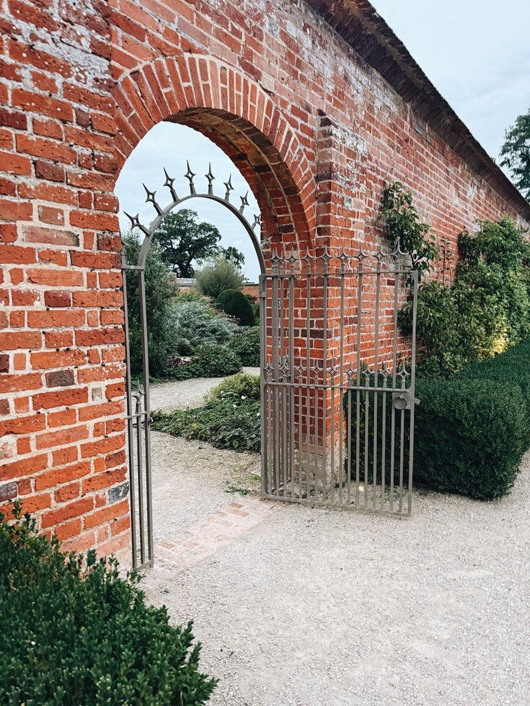 A brick arch into the walled garden
