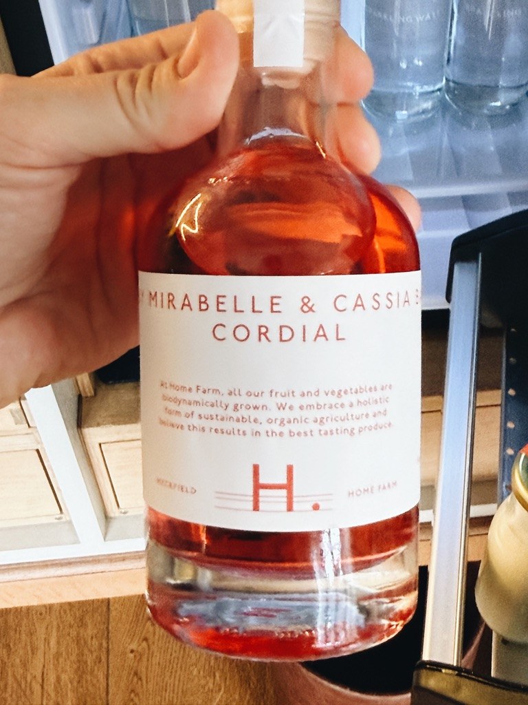 A bottle of Heckfield mirabelle and cassis cordial