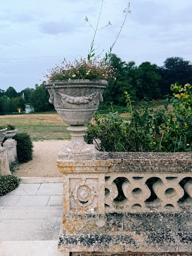 A stone urn on the terrace balustrade