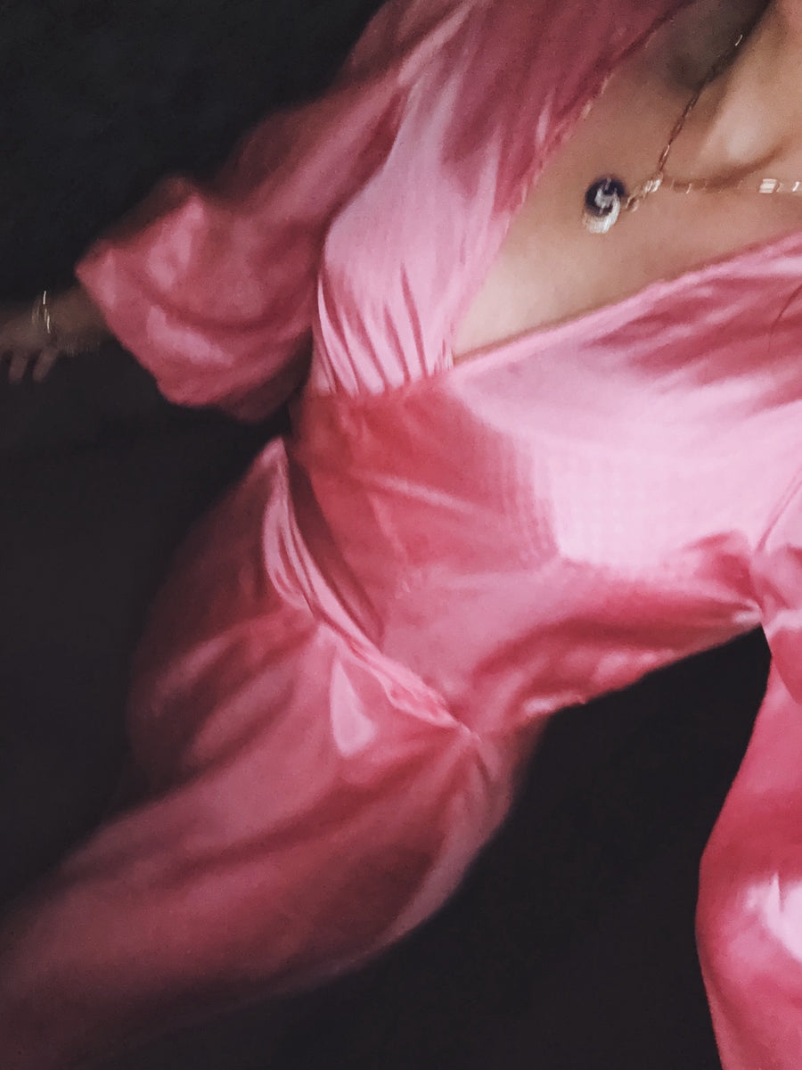 A pink silk dress